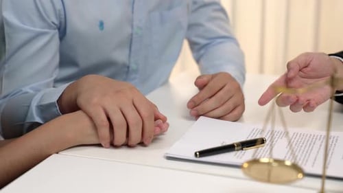 Loving couple seek legal consultation and assistance from law firm. Rigid.