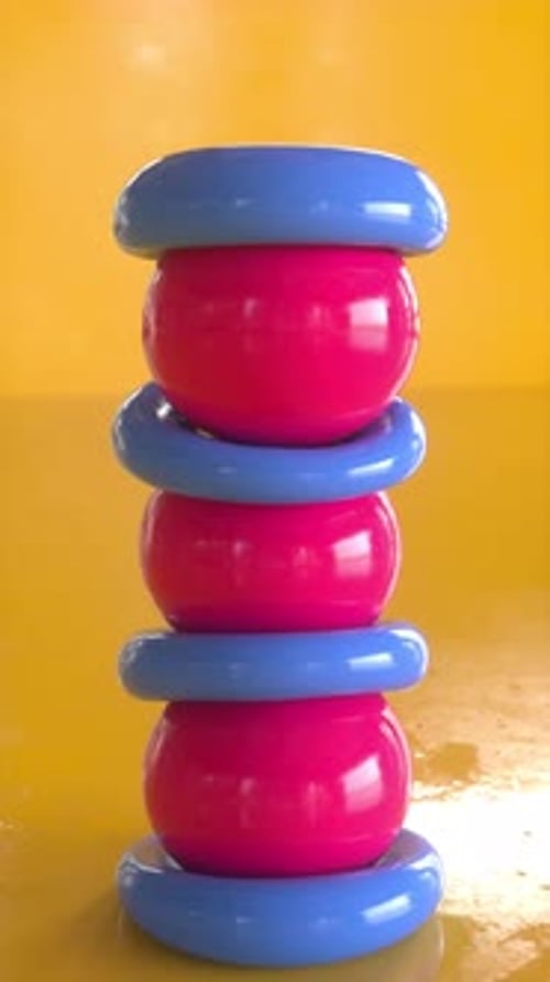 Glossy 3D Spheres and Rings Stacking Animation Loop