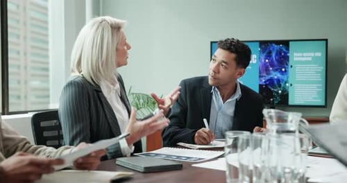 Corporate Team Collaborating in Bright Modern Workplace