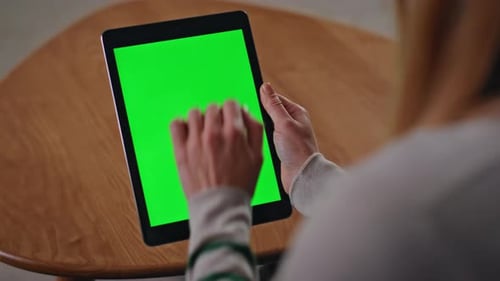 Hands Swiping Green Screen Tablet in Apartment Close Up Woman Touching Mockup