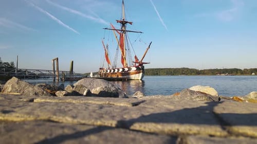 Low down view of Pinnace Virginia ship moored at the City of Bath on the Kennebec River