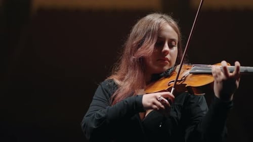 Female Violinist is Playing Violin in Music School Musician is Playing Classic or Neoclassic Music