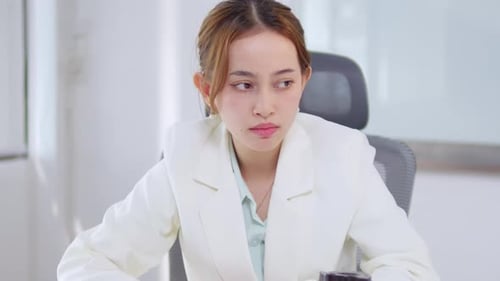 Business meeting dynamics office professional interaction modern workspace focused perspective