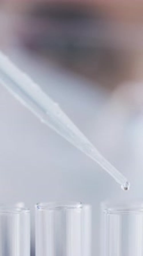 Lab Work: Pipette and Test Tubes in a Lab