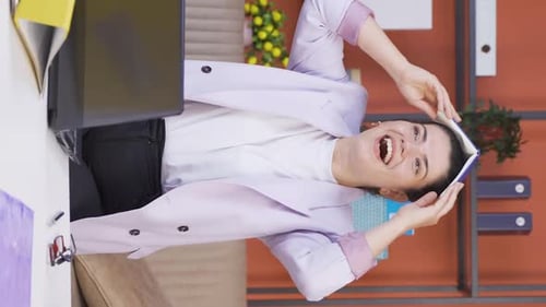 Vertical video of Home office worker woman funny and entertaining.