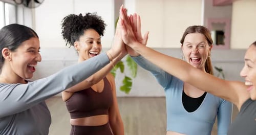 Laughing Women Give High Five After Workout