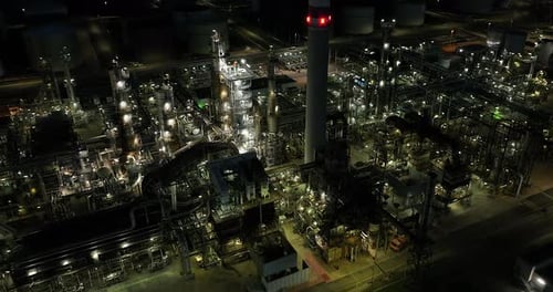 Industrial factory polluting carbon dioxide emission of fossil fuels affecting climate change