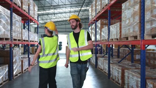 ฺBoth of employee in auto parts warehouse Having fun dancing
