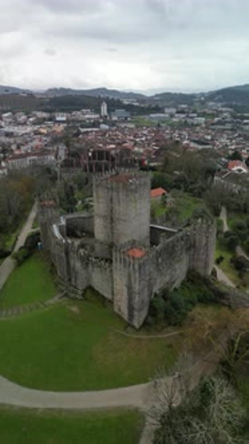 Aerial view of medieval castle and historic cityscape, Portugal.