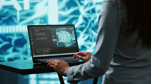 AI Computer Scientist Using Laptop for Business Data Analysis in High Tech Workspace