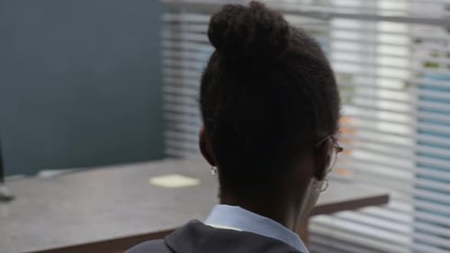 Man Communicating with Female Manager when Visiting Bank Office
