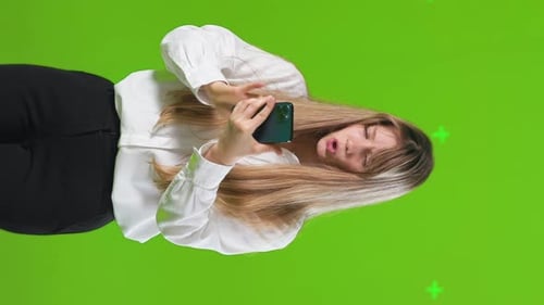 Woman Using Smartphone on Green Screen Background