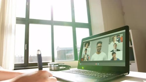 Remote Job, Technology and People Concept - Young Businesswoman with Laptop Computer