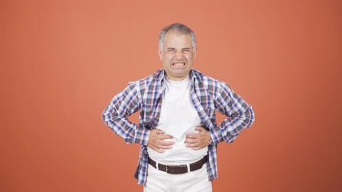 Man experiencing stomachache.
