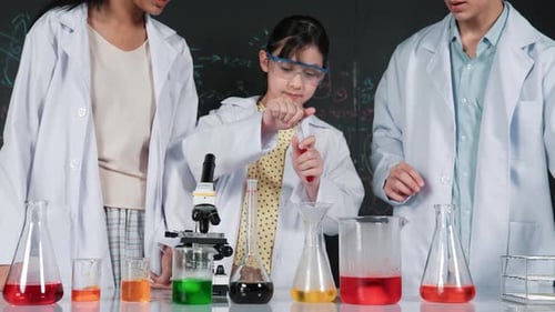 Child Student Learns Science with Microscope and Experiment