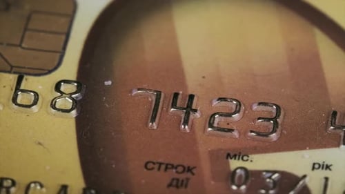 Plastic Credit Card Rotates Close Up