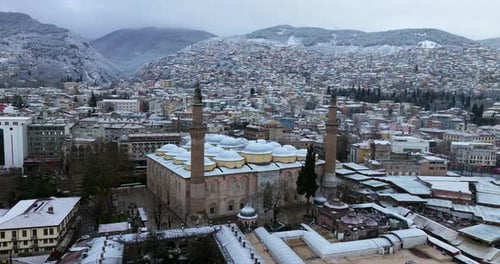 Aerial View Of Grand Mosque Of Bursa During Winter In Bursa, Turkey - drone shot