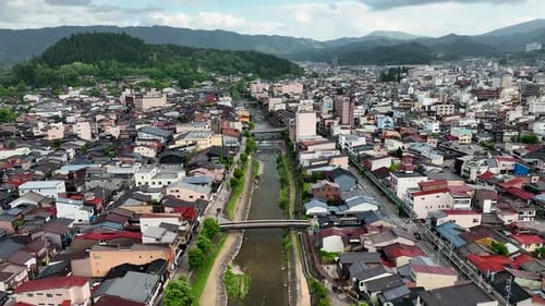 Aerial view of river running through city, Japan.