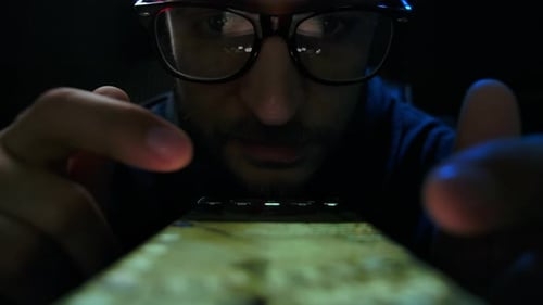 Close Up of Man Using a Cell Phone