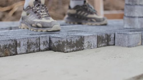 Installing Gray Pavers in Sand