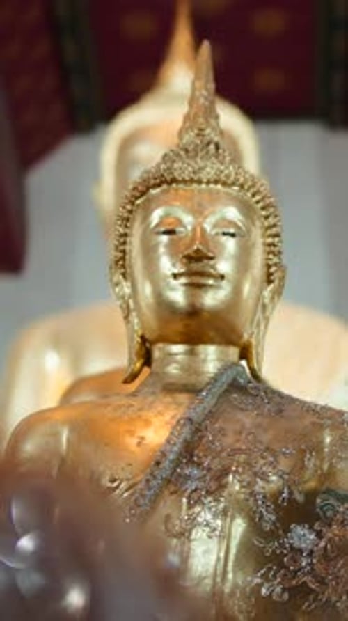 Golden Buddha Statue in a Traditional Thai Temple