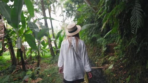 Carefree Blonde Woman in Straw Hat Admire View Mountain Waterfall in Wild Nature Girl Tourist in