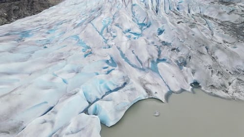 Aerial Fly Over of ice covered Glacier