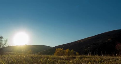 Mountain Meadow Timelapse at the Summer or Autumn Sunset Time Wild Nature and Rural Field Clear Sky