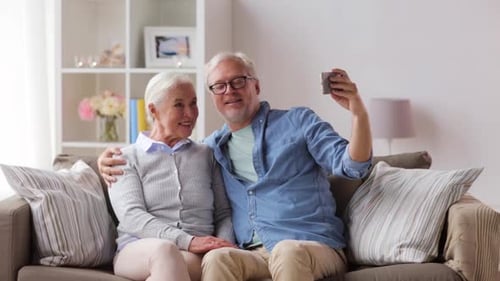 Senior Couple Taking a Selfie at Home