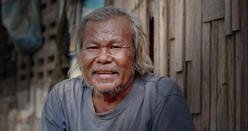 Smiling Senior Man with Grey Hair