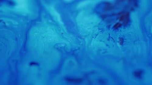Abstract Blue Liquid Swirls in Mesmerizing Motion