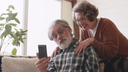 Senior Couple Enjoying a Video Call at Home