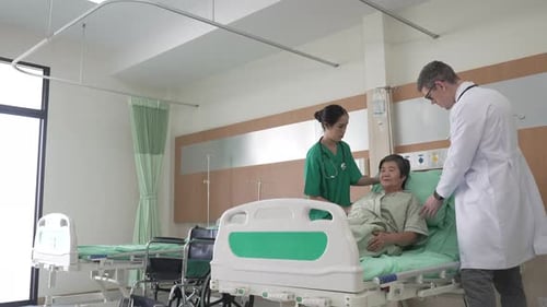 Doctor check up senior patient at hospital.