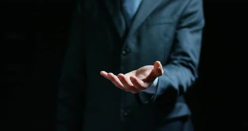 Hand Offering Receiving Applause Dark Corporate Setting