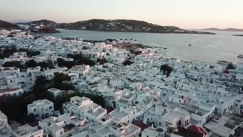 Mykonos island Greece from a drone view of the old town at sunset