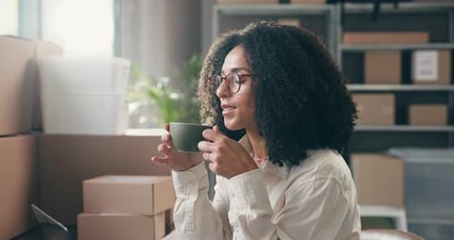 Supply chain, happy and woman with coffee in office for distribution, logistics