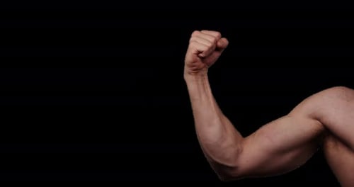 Hand gestures with alpha channel. Pre keyed. Athletic crossfit forearm showing encouraging fist gest