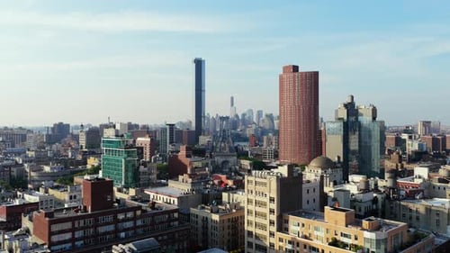 Aerial View of Manhattan's Diverse Architecture and The Brooklyn Tower Next to Manhattan Bridge