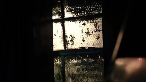 Old window with its dirty glass, HD video cinematic in horror environment