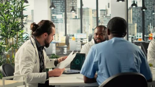 Medical Team Discussing Brain Scans in a Modern Office
