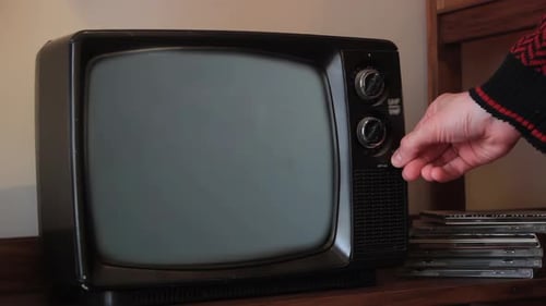 Hand Turning On Retro TV with Green Screen Chroma Key
