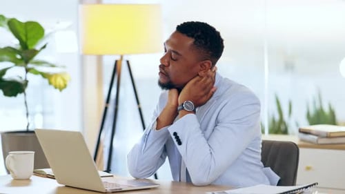 Business, black man and neck pain in office, injury or muscle problem while working on laptop