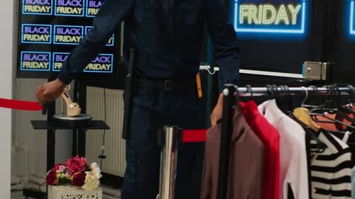 Security Guard Opens Doors for Black Friday Shoppers