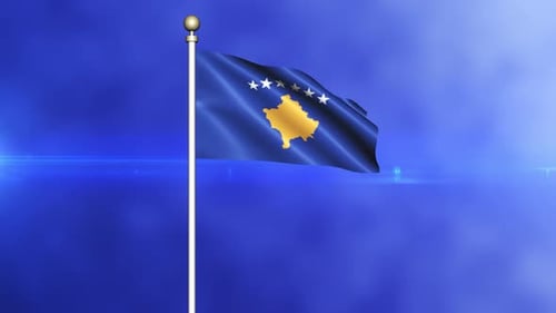 Bandera de Kosovo ondeando en un mástil