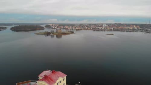 Aerial footage of Kruthuset a historical old building located in the ocean at Karlskrona, Sweden. I