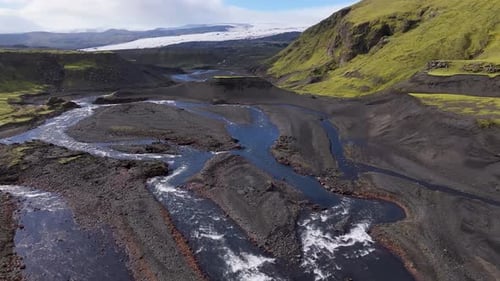 Aerial view of blafjallakvisl waterfall in scenic valley, Iceland.