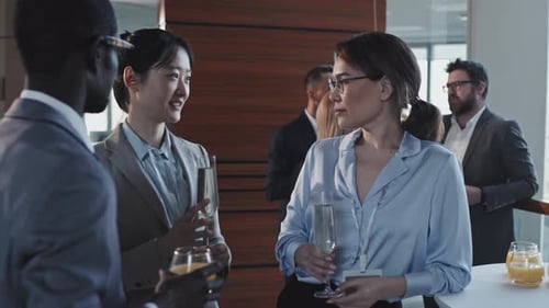 Young Colleagues Chatting About Something