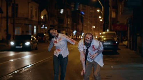 Scary Braineating Walking Dead Corpses Looking Frightening While Prowling Through City at Night
