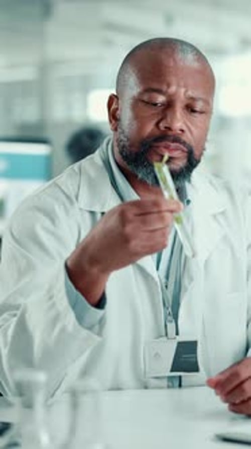 Biotechnology, man and plant with test tube in laboratory for botany, pharmaceutical