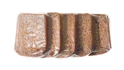 Packaged Brown Rye Bread Slices Close Up